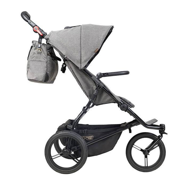 Mountain Buggy urban jungle luxury collection stroller in herringbone grey colour comes with matching herringbone grey satchel that attaches to your buggy side view_herringbone