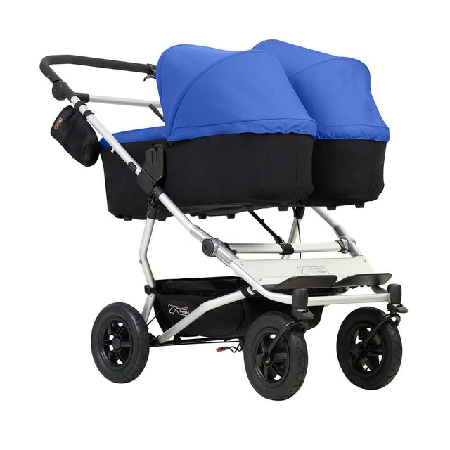 mountain buggy duet double buggy with two carrycot plus in lie flat mode 3/4 view shown in color marine_marine
