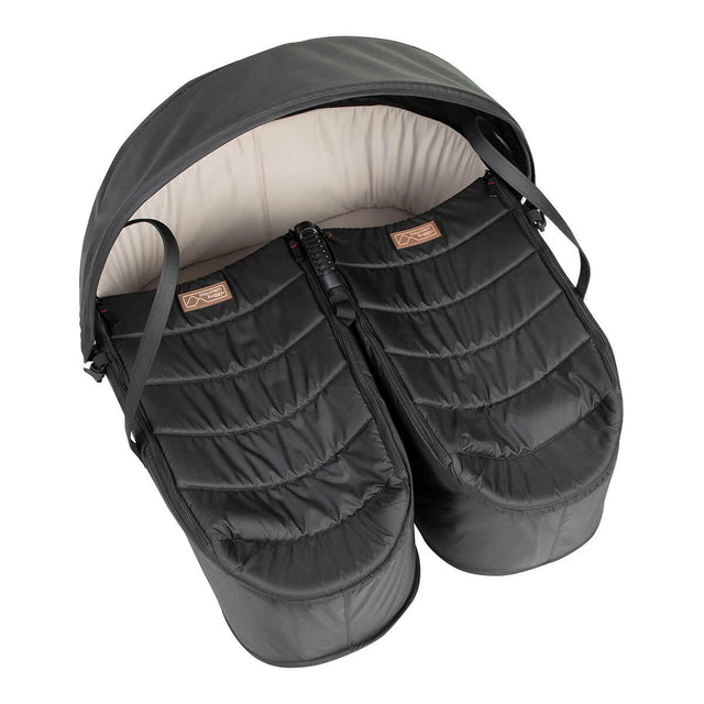Mountain Buggy® cocoon™ for twins shown from above with the covers zipped up in place creating a warm comfy space for newborns